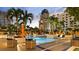 Luxury pool area with lounge chairs and umbrellas at 100 1St N Ave # 503, St Petersburg, FL 33701