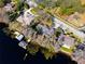 Aerial view showcasing home's waterfront location and neighborhood at 10106 Tarpon Springs Rd, Odessa, FL 33556