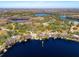 Aerial view showcasing waterfront property location at 10106 Tarpon Springs Rd, Odessa, FL 33556