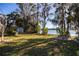 Spacious backyard with shed and lake access at 10106 Tarpon Springs Rd, Odessa, FL 33556