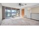 Main bedroom with sliding doors to deck overlooking the lake at 10106 Tarpon Springs Rd, Odessa, FL 33556