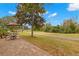 Enjoy the golf course view from this relaxing patio area at 1084 Dunrobin Dr # D, Palm Harbor, FL 34684