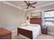 Bedroom featuring classic furnishings and a ceiling fan adding comfort and appeal at 1097 Eden Isle Ne Dr, St Petersburg, FL 33704