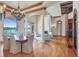 Elegant dining room with decorative pillars and a waterfront view at 1097 Eden Isle Ne Dr, St Petersburg, FL 33704