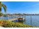 A private wooden dock on the intercoastal waterway at 1097 Eden Isle Ne Dr, St Petersburg, FL 33704