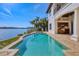 Beautiful waterfront home with a private swimming pool and outdoor kitchen, and an amazing view at 1097 Eden Isle Ne Dr, St Petersburg, FL 33704