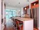 Modern kitchen with granite countertops and breakfast bar at 111 N 12Th St # 1615, Tampa, FL 33602