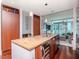 Modern kitchen with granite countertop island and stainless steel appliances at 111 N 12Th St # 1615, Tampa, FL 33602