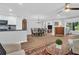 Open concept dining area with chandelier and kitchen access at 1162 Rustlewood Ct, Palm Harbor, FL 34684