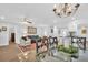 Open dining room with a view of the living room and kitchen at 1162 Rustlewood Ct, Palm Harbor, FL 34684