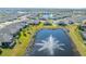 Aerial view of community with pond and fountain at 13305 Waterleaf Garden Cir, Riverview, FL 33579