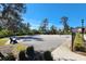 Outdoor basketball court with a nearby bench at 13305 Waterleaf Garden Cir, Riverview, FL 33579