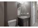 Small powder room with single sink vanity and toilet at 13305 Waterleaf Garden Cir, Riverview, FL 33579