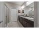 Modern bathroom with double vanity and walk-in shower at 13305 Waterleaf Garden Cir, Riverview, FL 33579