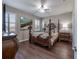 Main bedroom with a large bed and plenty of natural light at 13305 Waterleaf Garden Cir, Riverview, FL 33579