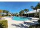 Inviting community pool with lounge chairs at 13305 Waterleaf Garden Cir, Riverview, FL 33579