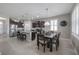 Open kitchen with stainless steel appliances and an island at 13305 Waterleaf Garden Cir, Riverview, FL 33579