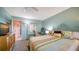 Comfortable bedroom with a large window, ceiling fan, and desk at 1366 Stafford Ln # 1420, Sarasota, FL 34232