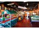 Indoor market with large 'More Produce Inside' sign, overflowing with fresh produce and specialty items at 1366 Stafford Ln # 1420, Sarasota, FL 34232