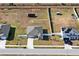 Aerial view of a row of houses with solar panels at 1418 Bluejack Oak Dr, Seffner, FL 33584