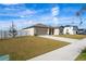 Single-story home with a garage and fenced yard at 1418 Bluejack Oak Dr, Seffner, FL 33584