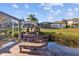 Waterfront property with backyard access to a private wooden dock at 1893 Riveredge Dr, Tarpon Springs, FL 34689