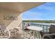 Relaxing balcony boasting scenic water views and outdoor seating at 19725 Gulf Blvd # 405, Indian Shores, FL 33785