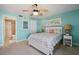 Bedroom with coastal decor and ensuite bathroom at 19725 Gulf Blvd # 405, Indian Shores, FL 33785