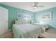 Guest bedroom with two twin beds, light walls, and coastal decor at 19725 Gulf Blvd # 405, Indian Shores, FL 33785