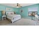 Bright bedroom with water view and coastal decor at 19725 Gulf Blvd # 405, Indian Shores, FL 33785