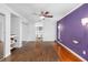 Bedroom with mirrored closet doors and hardwood floors at 210 Lee St, Oldsmar, FL 34677