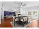 Bright dining area with hardwood floors and view of pool at 210 Lee St, Oldsmar, FL 34677