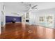 Open living space with hardwood floors and fireplace at 210 Lee St, Oldsmar, FL 34677