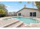 Inviting pool and spa with brick patio at 210 Lee St, Oldsmar, FL 34677