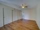 Bedroom with wood floors and double closets at 2363 Israeli Dr # 61, Clearwater, FL 33763