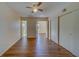 Spacious bedroom with wood floors and ceiling fan at 2363 Israeli Dr # 61, Clearwater, FL 33763