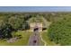 Grand entrance to the community with lush landscaping at 2363 Israeli Dr # 61, Clearwater, FL 33763