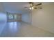 Bright living room with tile floors and ceiling fan at 2363 Israeli Dr # 61, Clearwater, FL 33763