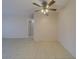 Spacious living room featuring tile floors and a ceiling fan at 2363 Israeli Dr # 61, Clearwater, FL 33763