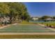 Community shuffleboard courts nestled amongst lush landscaping at 2363 Israeli Dr # 61, Clearwater, FL 33763