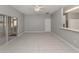 Dining room with gray walls, tiled floor, and sliding glass doors at 24156 Buckingham Way, Punta Gorda, FL 33980