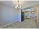 Dining area with tile floors and a view of the kitchen at 2421 Lancaster Dr, Sun City Center, FL 33573