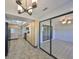 Kitchen with a view of the dining area and sunroom at 2421 Lancaster Dr, Sun City Center, FL 33573