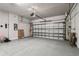 Spacious two car garage featuring sealed floor and automatic door at 2511 N Grady Ave # 23, Tampa, FL 33607