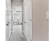 This hallway leads to a room with a desk and chair, perfect for a home office at 2511 N Grady Ave # 23, Tampa, FL 33607