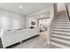 Open-concept layout with a staircase leading to upper floors at 2511 N Grady Ave # 23, Tampa, FL 33607