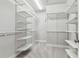 This walk-in closet is ready to be organized with its built-in shelving and storage at 2511 N Grady Ave # 23, Tampa, FL 33607