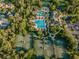 Seven Oaks community pool, tennis courts, and clubhouse at 26914 Juniper Bay Dr, Wesley Chapel, FL 33544