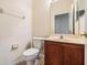 Bathroom features wood vanity and tile floor at 26914 Juniper Bay Dr, Wesley Chapel, FL 33544