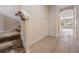 Entryway with staircase, tile floor and interior view at 26914 Juniper Bay Dr, Wesley Chapel, FL 33544